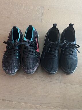 2 for 50.00 Nike Black Sneakers with Pink and Teal. Black one has a small tear